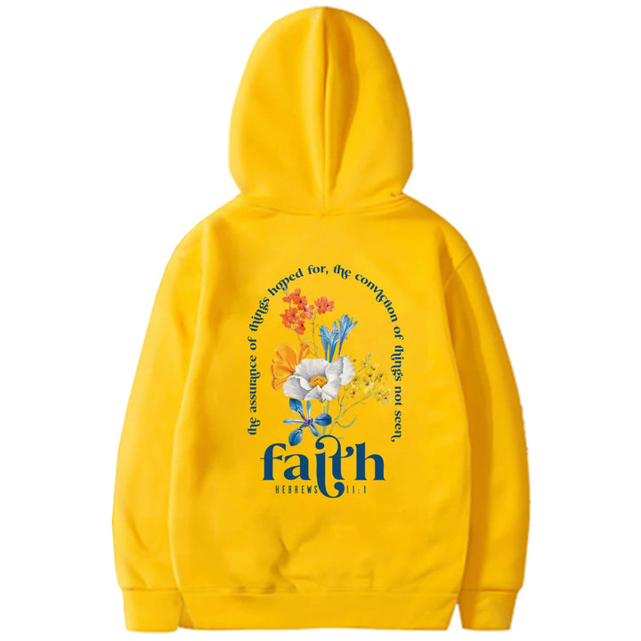 Woman wearing Bible verse graphic hoodie with long sleeves