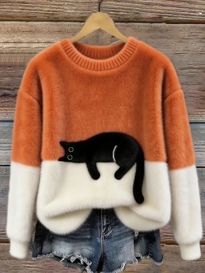 Women's knit sweater with sleeping cat design