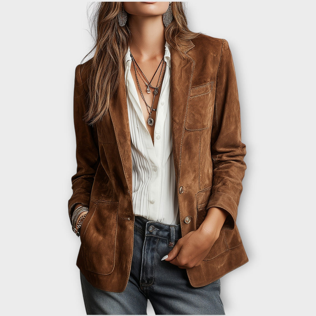 Woman wearing brown structured blazer with front buttons