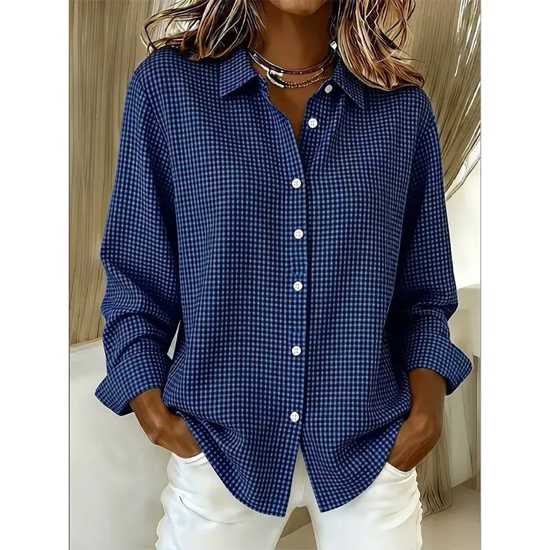 Woman wearing gingham button-front blouse with long sleeves