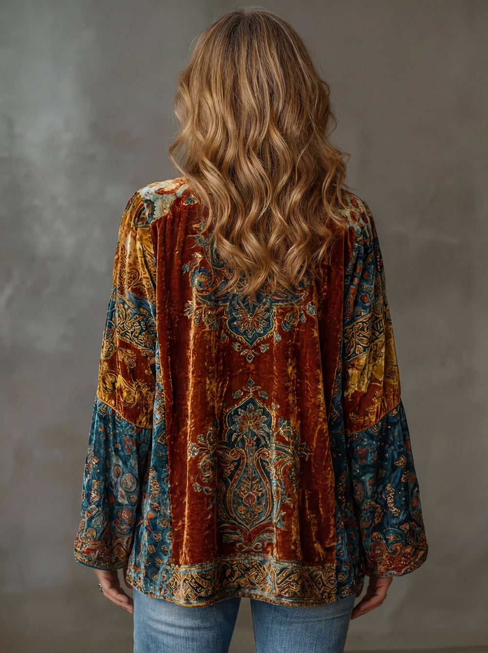Woman wearing boho kimono jacket with wide sleeves
