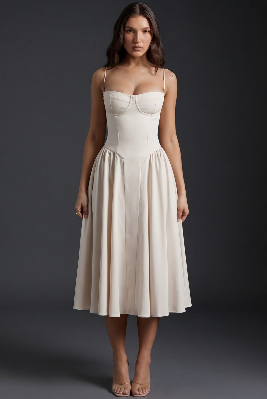 Woman wearing structured bodice midi dress with flared skirt