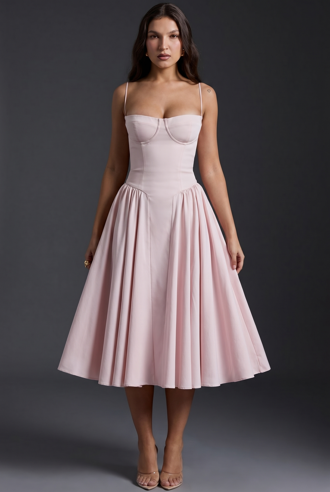 Woman wearing structured bodice midi dress with flared skirt