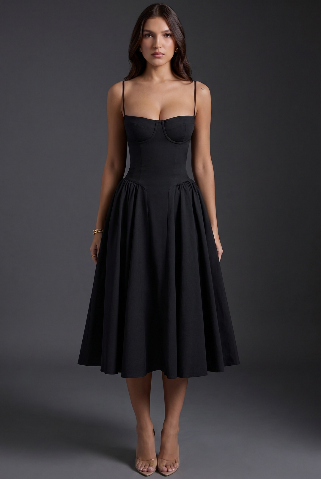 Woman wearing structured bodice midi dress with flared skirt
