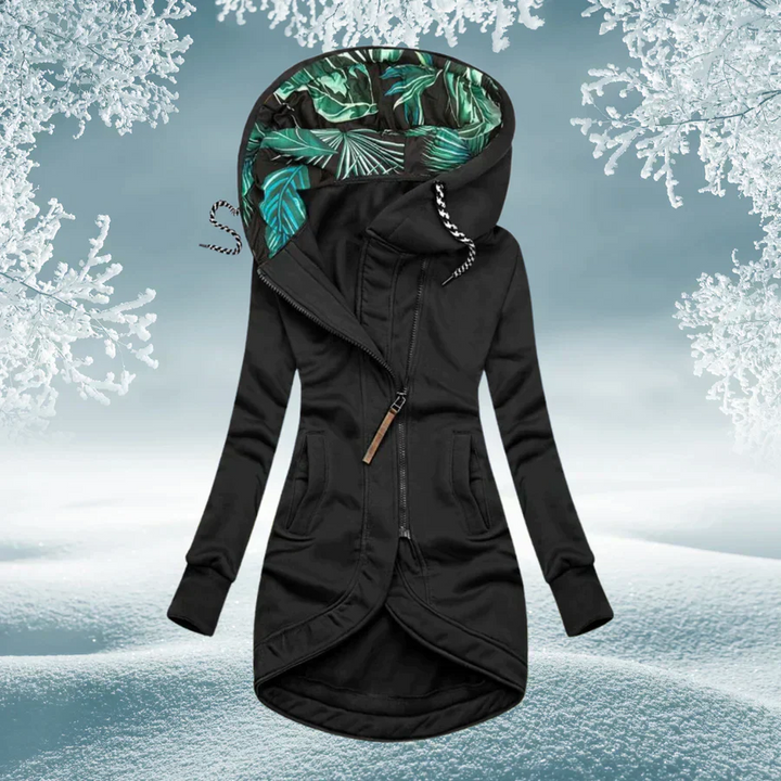 Woman wearing hooded rain coat with slim fit