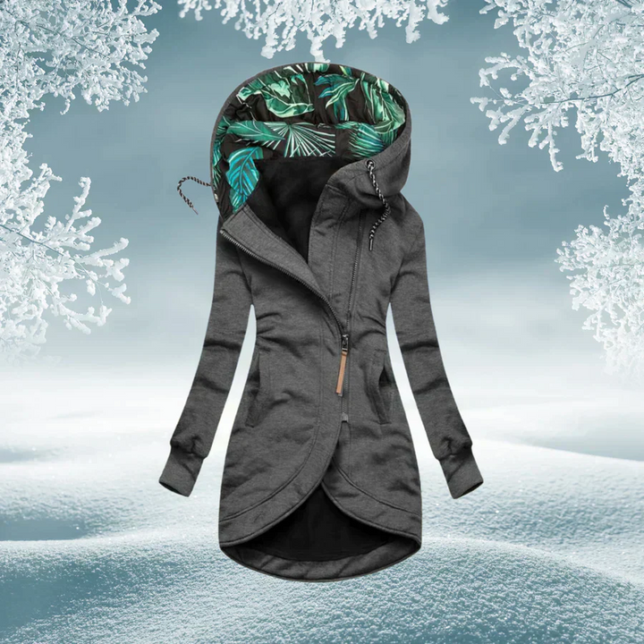 Woman wearing hooded rain coat with slim fit