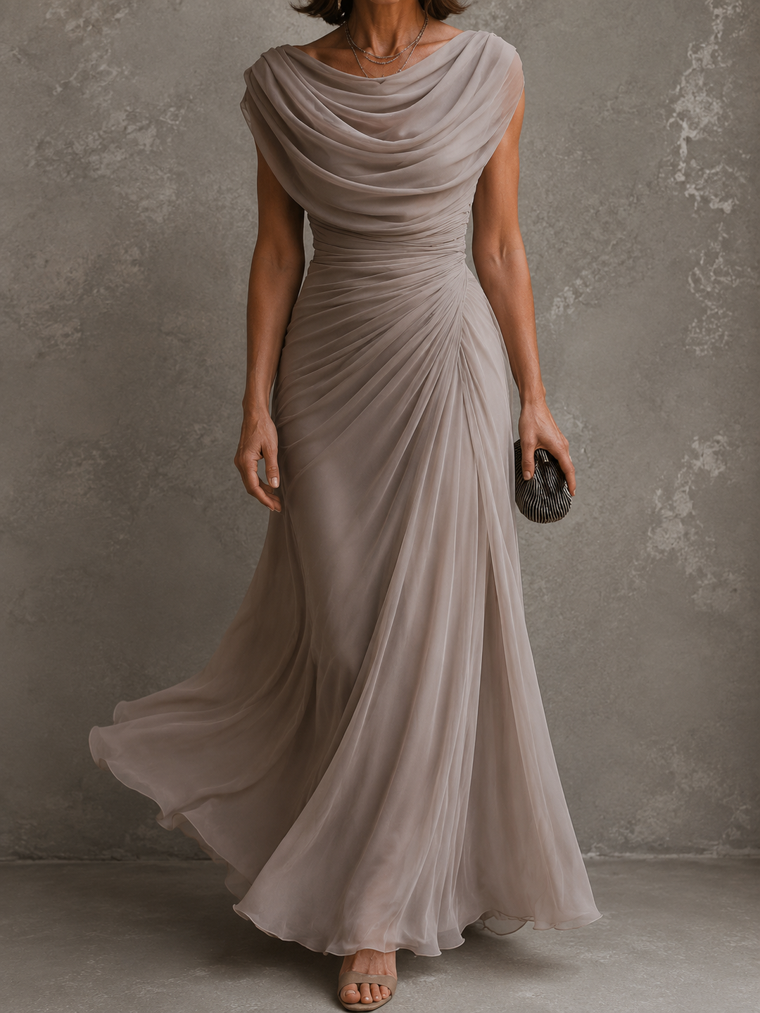 Sleeveless draped maxi dress with flowing full-length silhouette