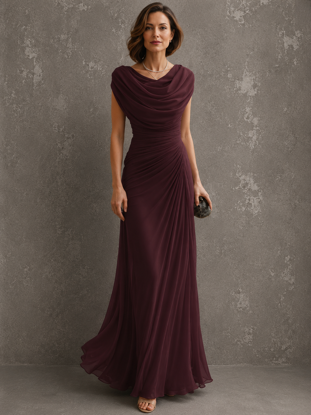 Sleeveless draped maxi dress with flowing full-length silhouette