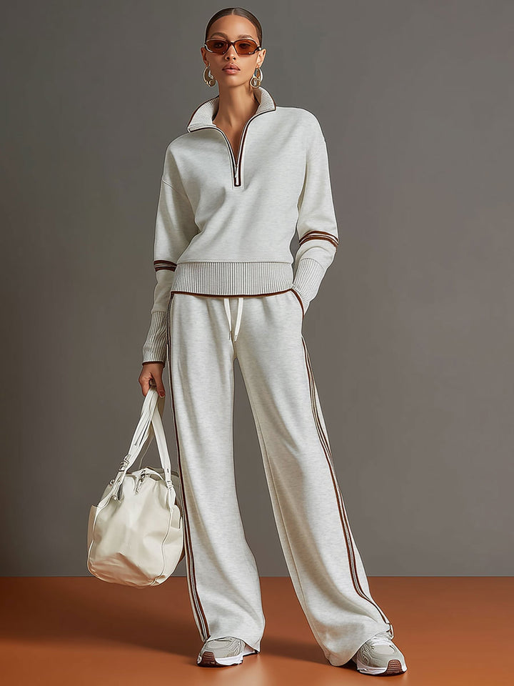 Woman wearing wide leg pants and blouse two-piece set