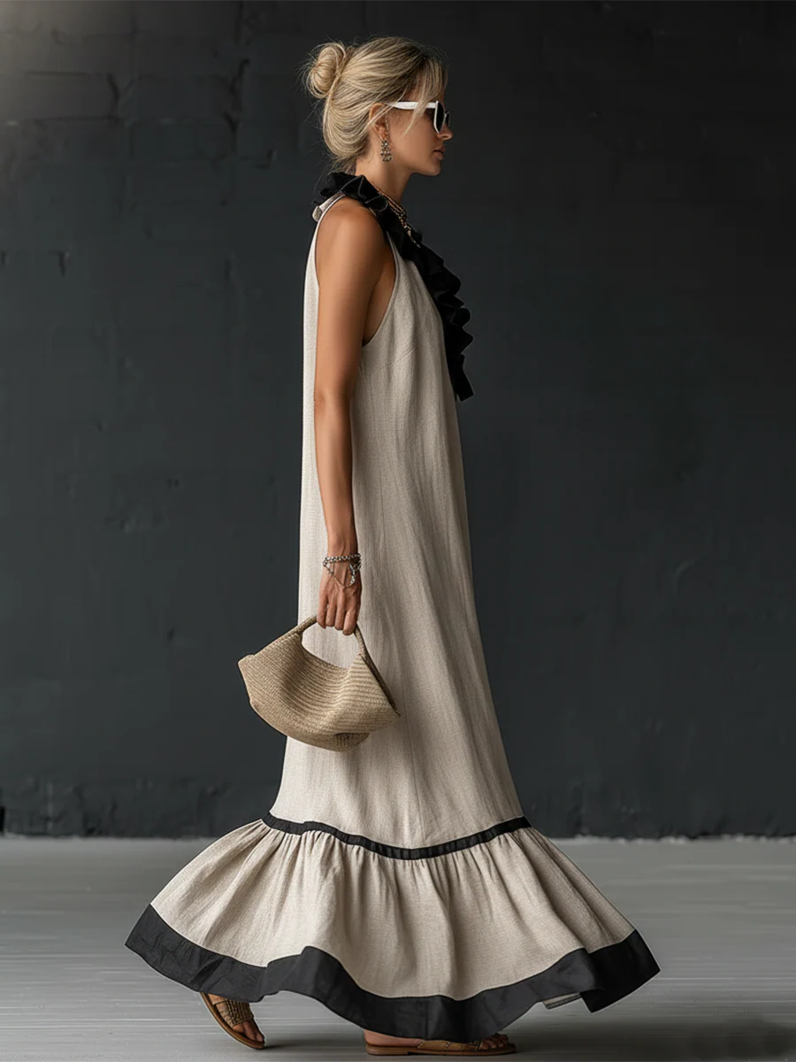 Woman wearing sleeveless color block maxi dress with ruffles