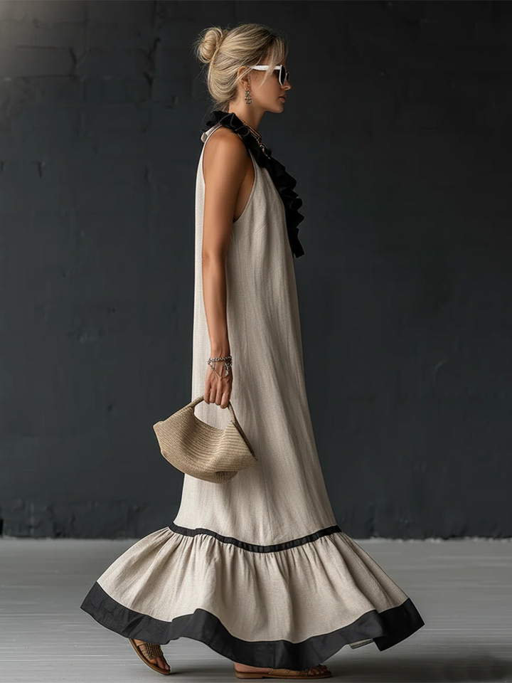 Woman wearing sleeveless color block maxi dress with ruffles