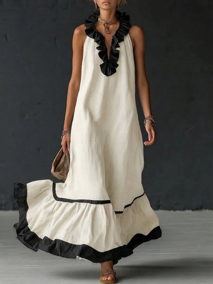 Woman wearing sleeveless color block maxi dress with ruffles