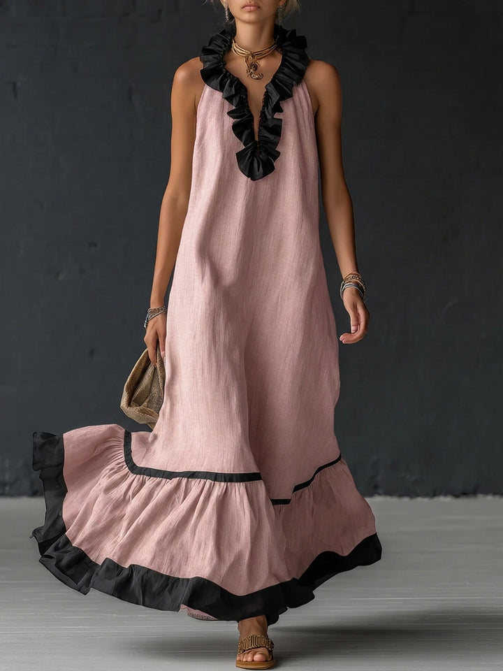 Woman wearing sleeveless color block maxi dress with ruffles