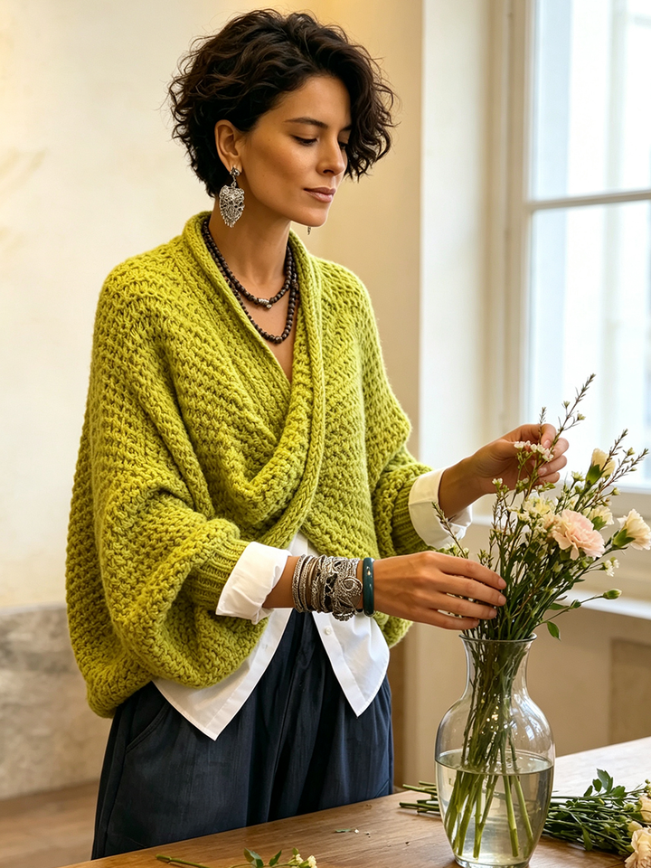 Woman wearing crossover V-neck batwing sleeve sweater
