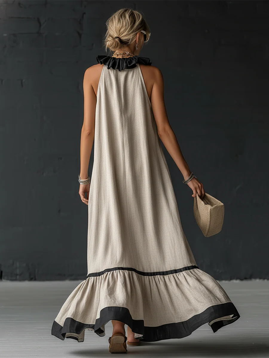 Woman wearing sleeveless color block maxi dress with ruffles
